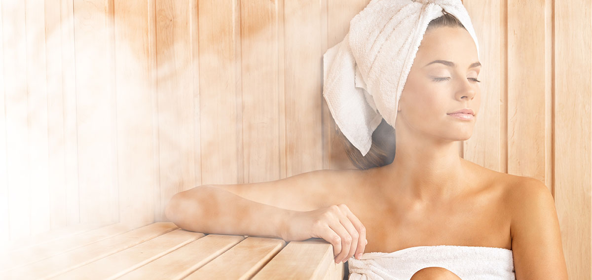 woman relaxing in a sauna